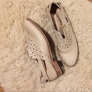 Cream color wooden sole shoe